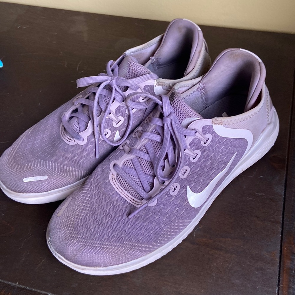 Purple Nike free sneakers